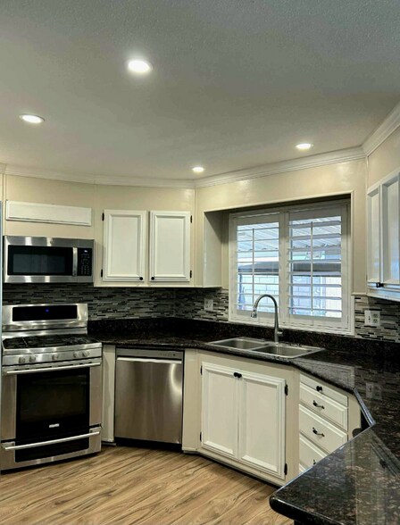 Building Photo - 39281 Palm Greens Pkwy