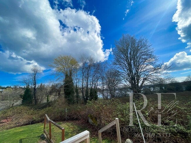 Building Photo - Whimsical Craftsman with Wraparound Porch, Bonus Room & Liberty Bay Peek Views