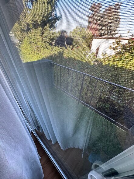 Building Photo - 7439 Woodman Ave