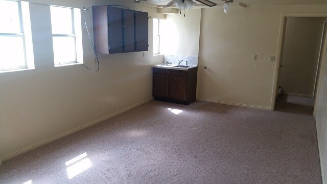 Building Photo - Great home with 2 car garage, deck and she...