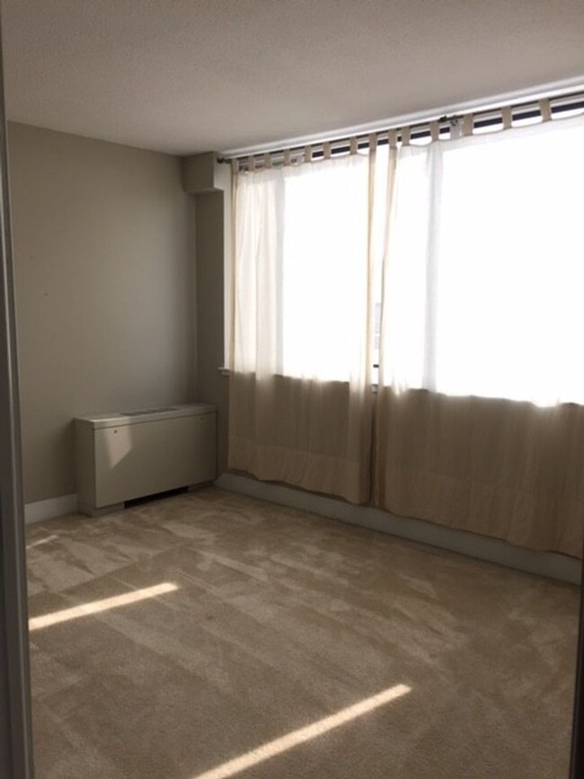 Building Photo - A spacious two bedroom, one bath apartment...