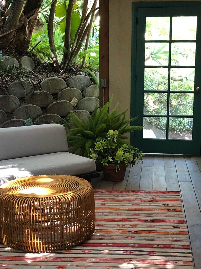 Outdoor living room includes wall heater - 1521 Portia St