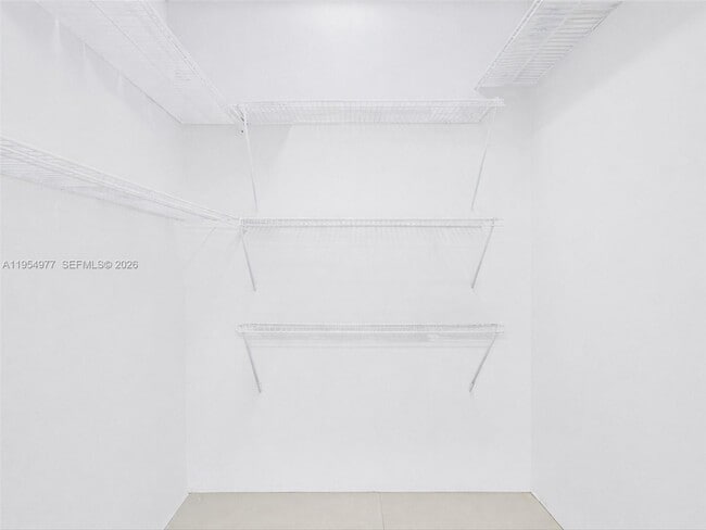 Building Photo - 3675 N Country Club Dr