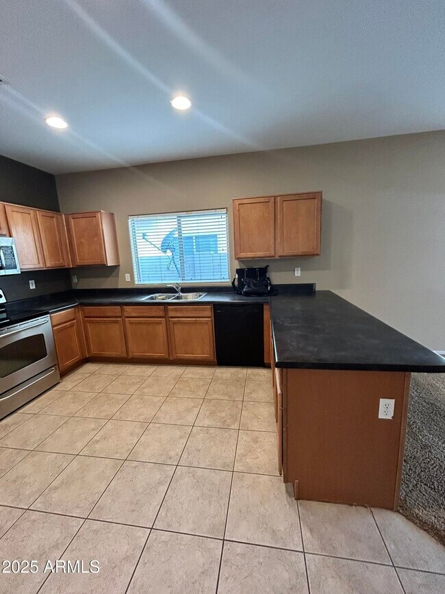 Building Photo - 45168 W Mescal Dr