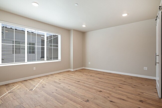 Building Photo - NEW CONSTRUCTION – Stylish 4-Bedroom Townh...