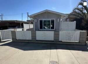 Building Photo - Cozy, Updated, and Pet-Friendly — Your New...