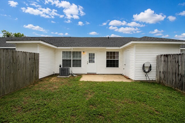 Building Photo - 2BR Patio Home with LVP Flooring, Private Fenced Yard, & Convenient Blue Angel Pkwy Location Near...