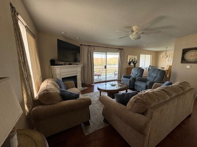 Building Photo - Riverfront 2BR 2BA Furnished Condo on GROUND LEVEL W/Garage and UTILITIES Included AVAIL 4/1/26