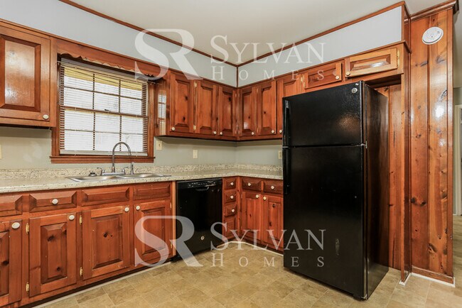 Building Photo - Lease today! No extra charge for contentme...