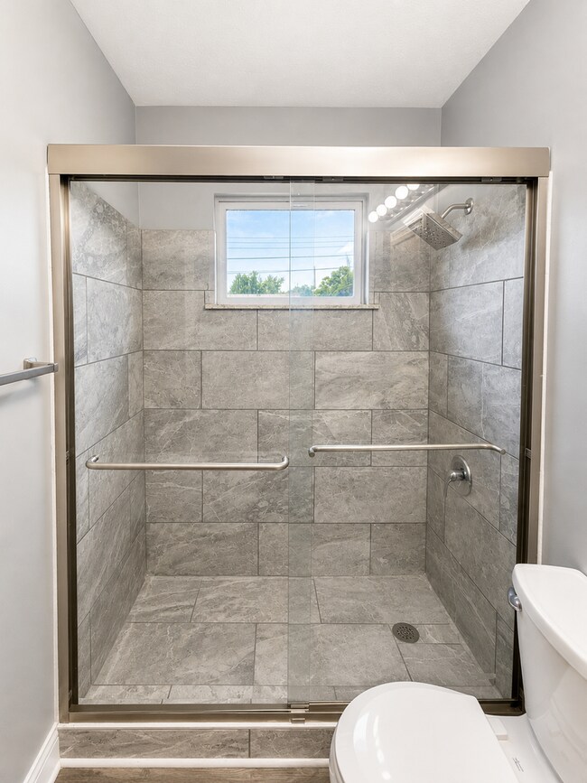 Building Photo - Stylishly Renovated 3-Bedroom Home with Finished Basement & Spacious Fenced Yard