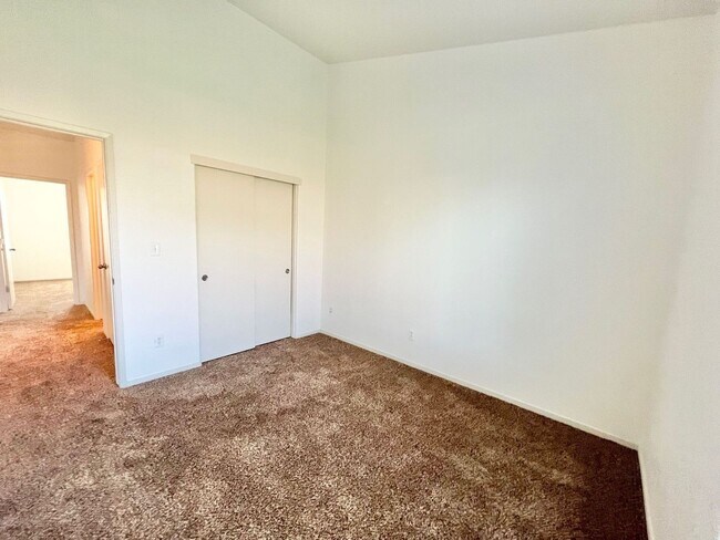 Building Photo - Large Corner Lot Home with Landscaping included!