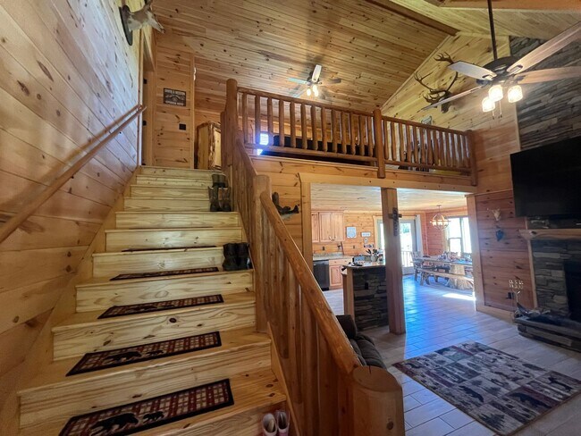 Building Photo - Gorgeous 3-Bedroom Log Cabin with Loft, Large Shop & Stocked Pond – Near Branford, FL