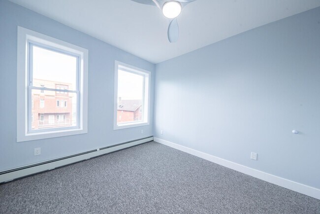 Building Photo - 1409 Manhattan Ave