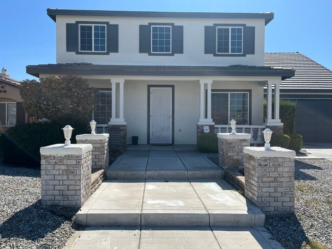Building Photo - Spacious 5-bedroom, 3-bathroom home in Ade...
