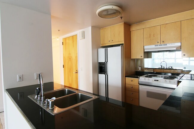 Building Photo - Stylish 1-Bedroom, 1-Bathroom Apartment in...