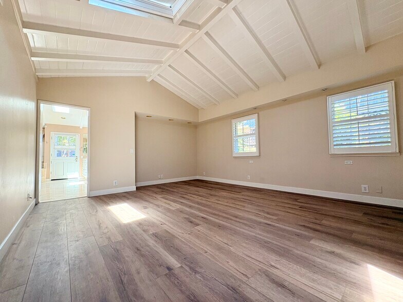 Primary bedroom and bath beyond - 752 S El Monte Ave