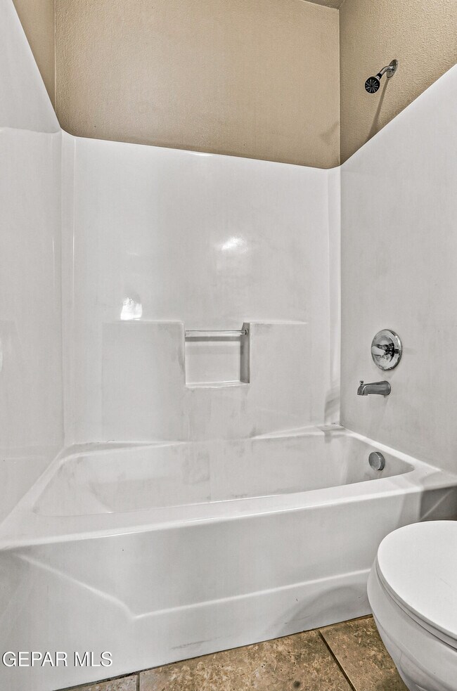 Building Photo - 7008 Faxon Dr