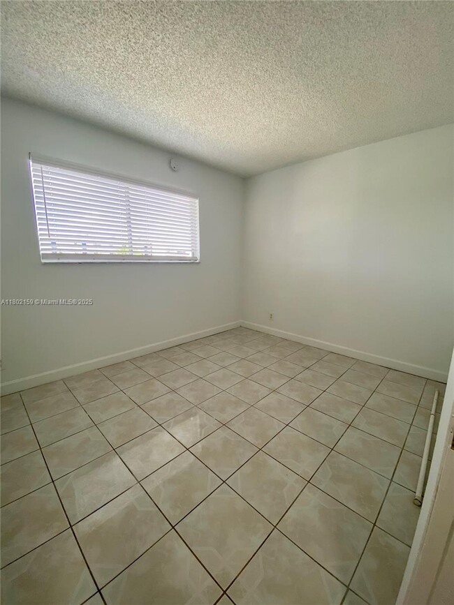 Building Photo - 8740 N Sherman Cir