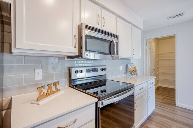 State of the art stainless steel appliances and custom cabinetry - Windsor on White Rock Lake