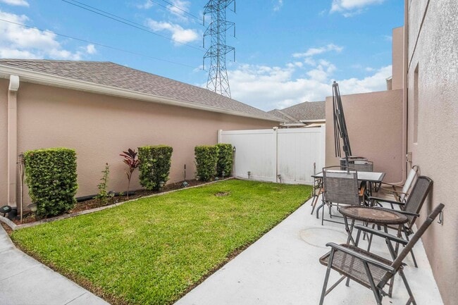 Building Photo - MOVE IN SPECIAL- 3/2.5 Townhome W/ 2 Car Garage For Rent in the Highly Desirable Avalon Park Comm...