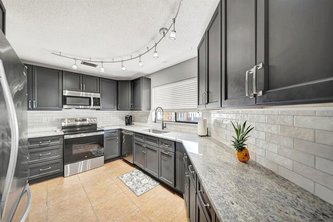 Building Photo - 9743 Saratoga Park Ct
