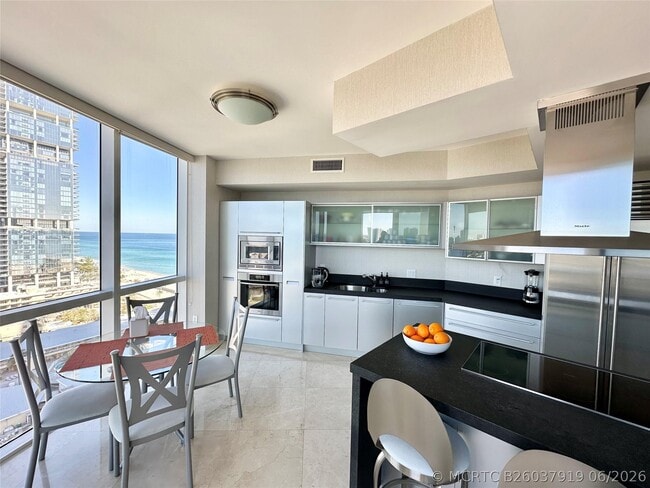 Building Photo - 18201 Collins Ave