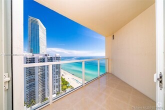 Building Photo - 16699 Collins Ave