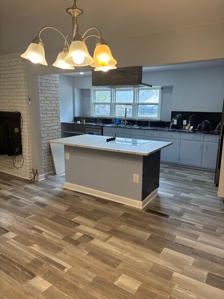 Kitchen Island with electric cooktop - 6225 Branch Hill Cir