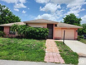Building Photo - Single Family 3 bedroom 2 bath Must See