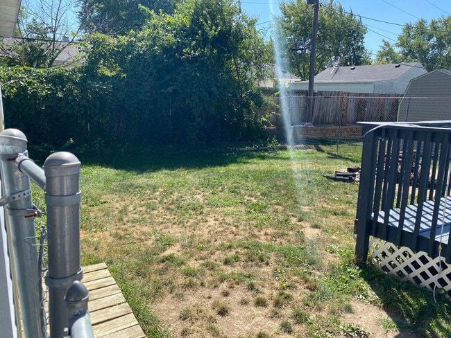 Building Photo - Spacious 4-Bedroom Home with Garage and Backyard in Milan!