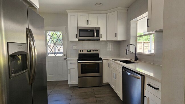Building Photo - Charming SODO Home with Fenced Backyard and Built-In Fire Pit