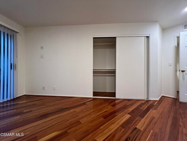 Building Photo - Welcome to this beautifully situated first-floor end unit