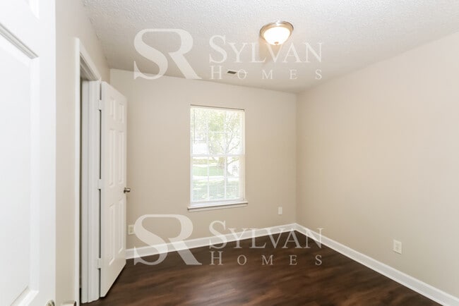 Building Photo - Come view this charming home