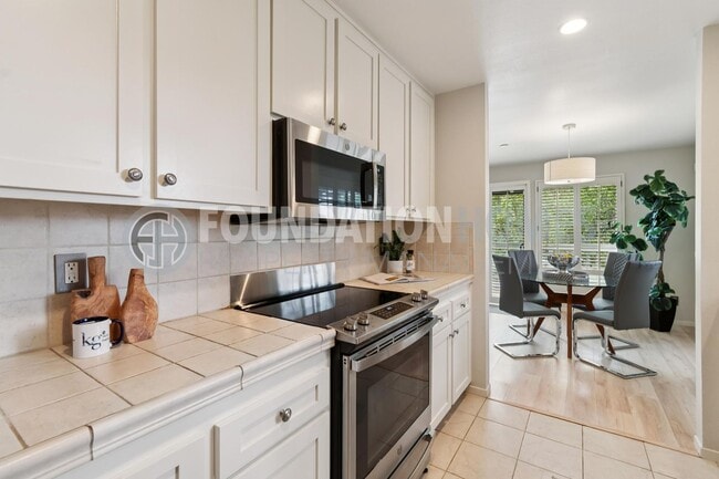 Building Photo - Tranquil Corte Madera Townhouse! DECK! 2 C...