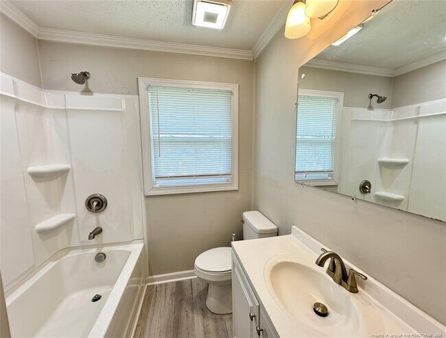 Building Photo - 3921 Village Dr
