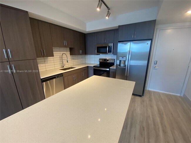Building Photo - 9000 Ramblewood Dr