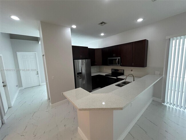 Building Photo - 1975 NW 100th Way