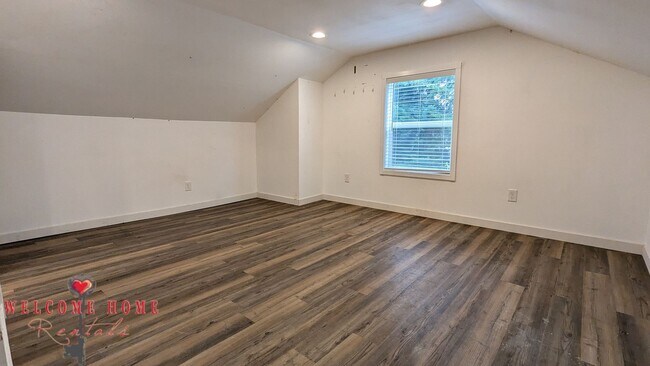 Building Photo - 4 bedroom home with air conditioning - Great location!!!  HUGE basement for your man cave or she ...