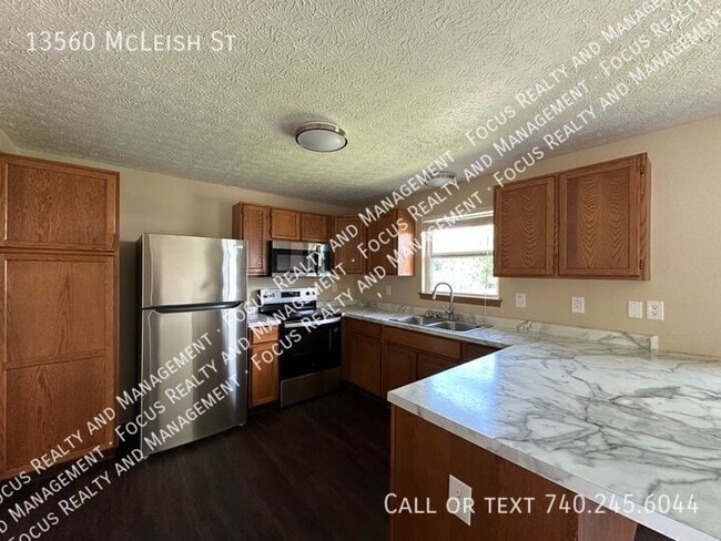 Building Photo - 13560 McLeish St