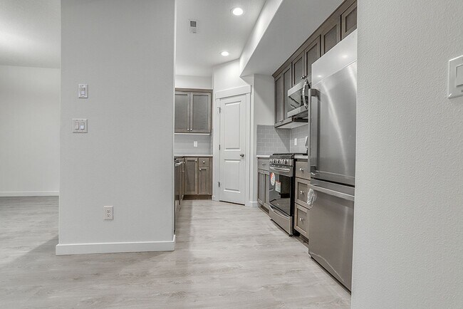 Building Photo - Modern Living in the Heart of Ridgefield: Quartz Finishes & Open-Concept Charm