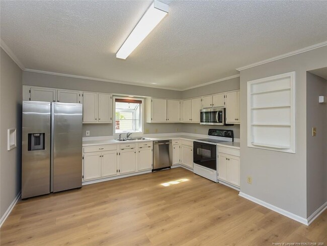 Building Photo - 4916 Royal Adelaide Way