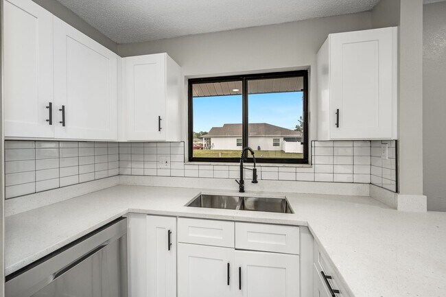 Building Photo - Charming Palm Bay Retreat - Perfect for Relaxation and Entertainment!