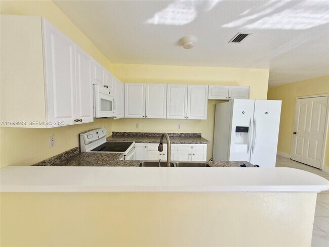 Building Photo - 1209 NW 27th Ave