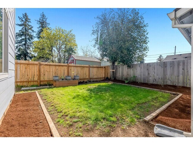 Building Photo - Bright Open-Concept Home with Vaulted Ceilings, Private Primary Suite & Stylish Modern Finishes