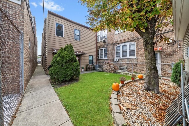 Building Photo - 5738 S Archer Ave