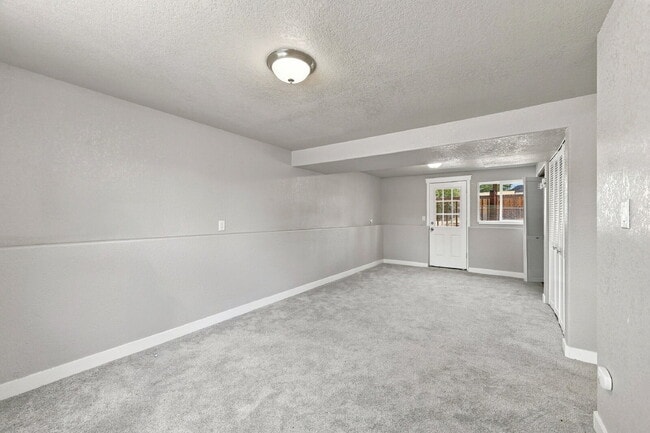 Building Photo - $2,095.95, 4 bed, 2 bath, located in Colorado Springs with a fenced-in backyard.