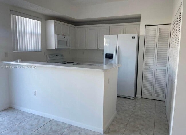 Building Photo - 5220 NW 109th Ave