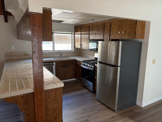 Building Photo - One level cabin with fenced backyard and garage