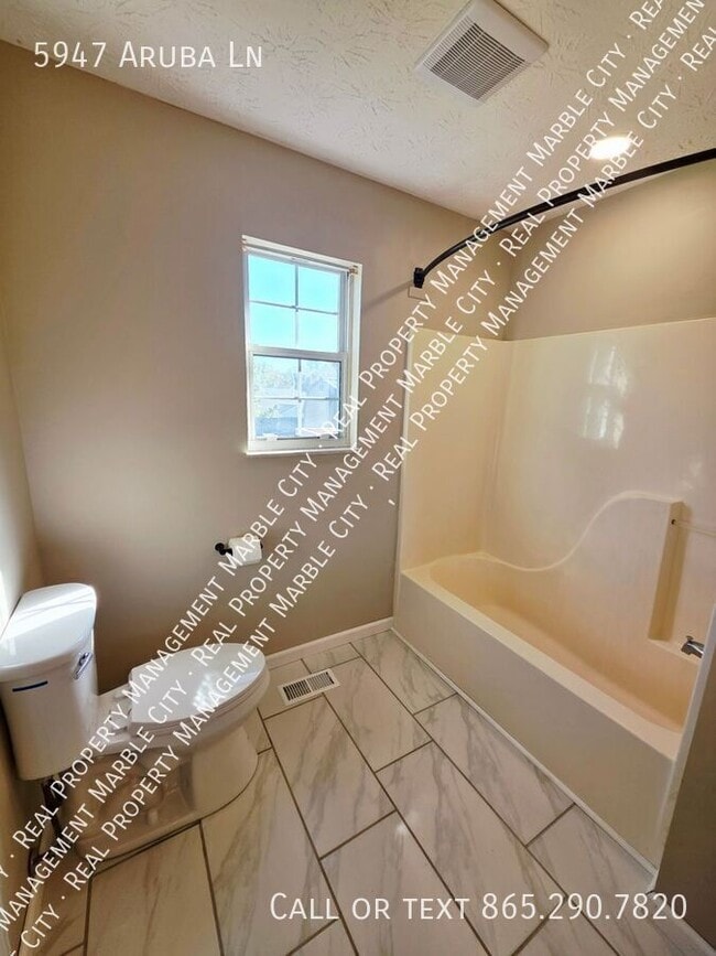 Building Photo - 5947 Aruba Ln