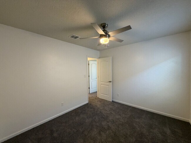 Building Photo - 4 Bedroom + Office Home Available Near Loma Colorado Blvd NE & Broadmoor Blvd NE in Rio Rancho!